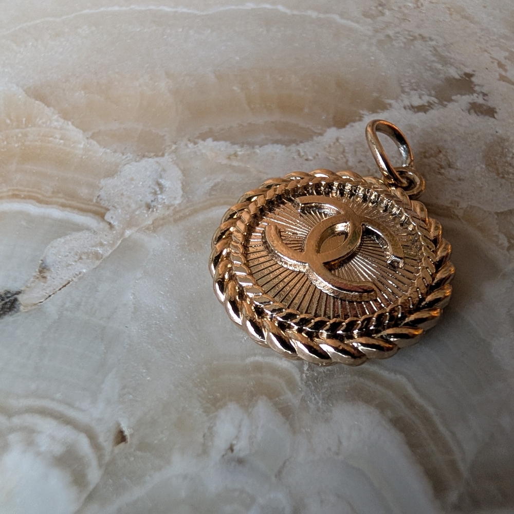 CHANEL CC Gold Pendant with Interlocking Design